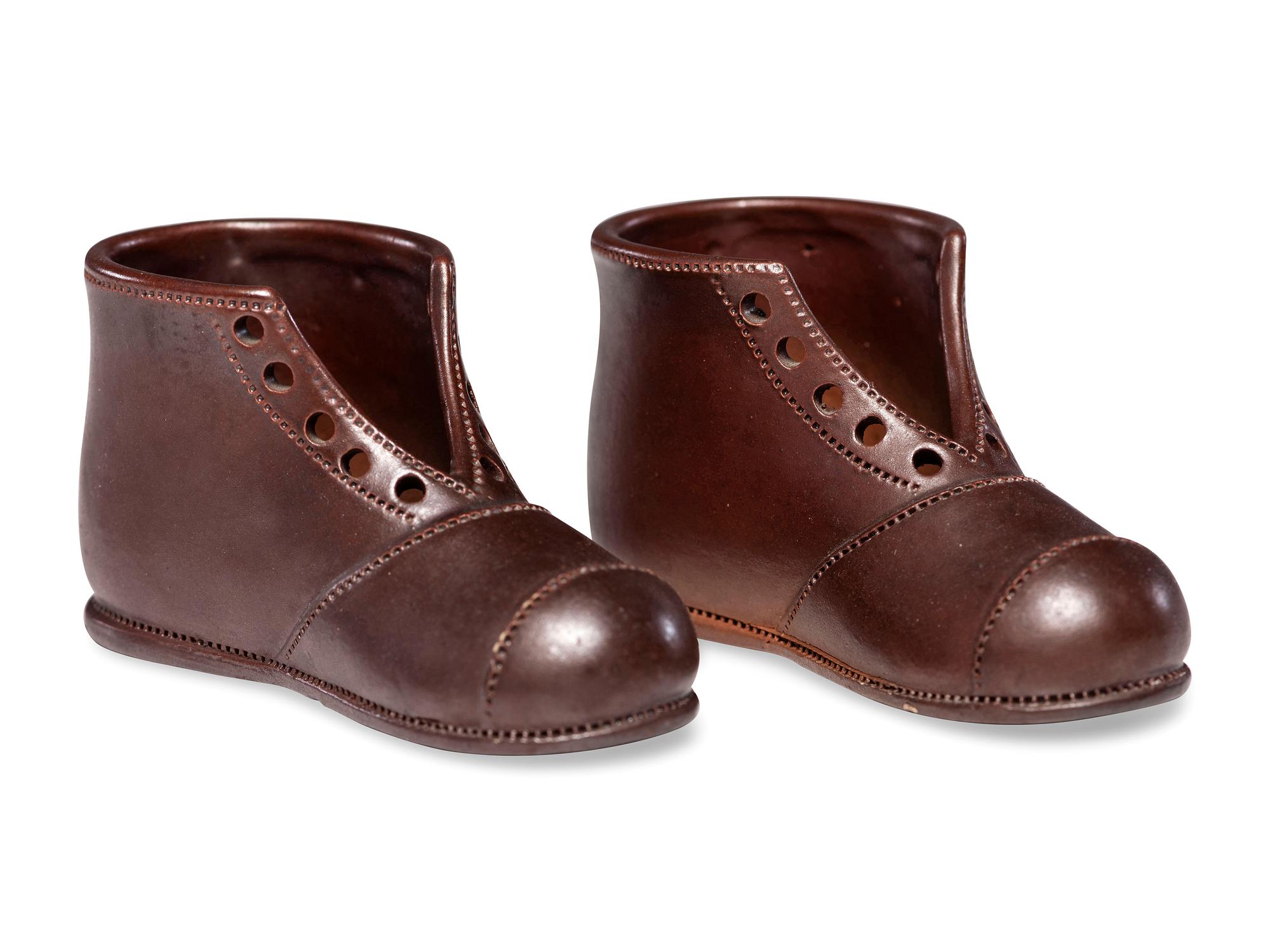 A Pair of Finely Crafted Glazed Pottery Shoes