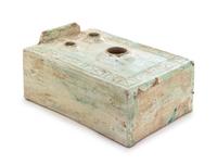 A Large Chinese Green Glazed Pottery Model of a Stove Length 13 1/2 x width 9 1/2 x height 5 1/4 inches. — HAN DYNASTY (206 B.C. - A.D. 220)