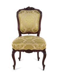 A Louis XV Carved Walnut Side Chair