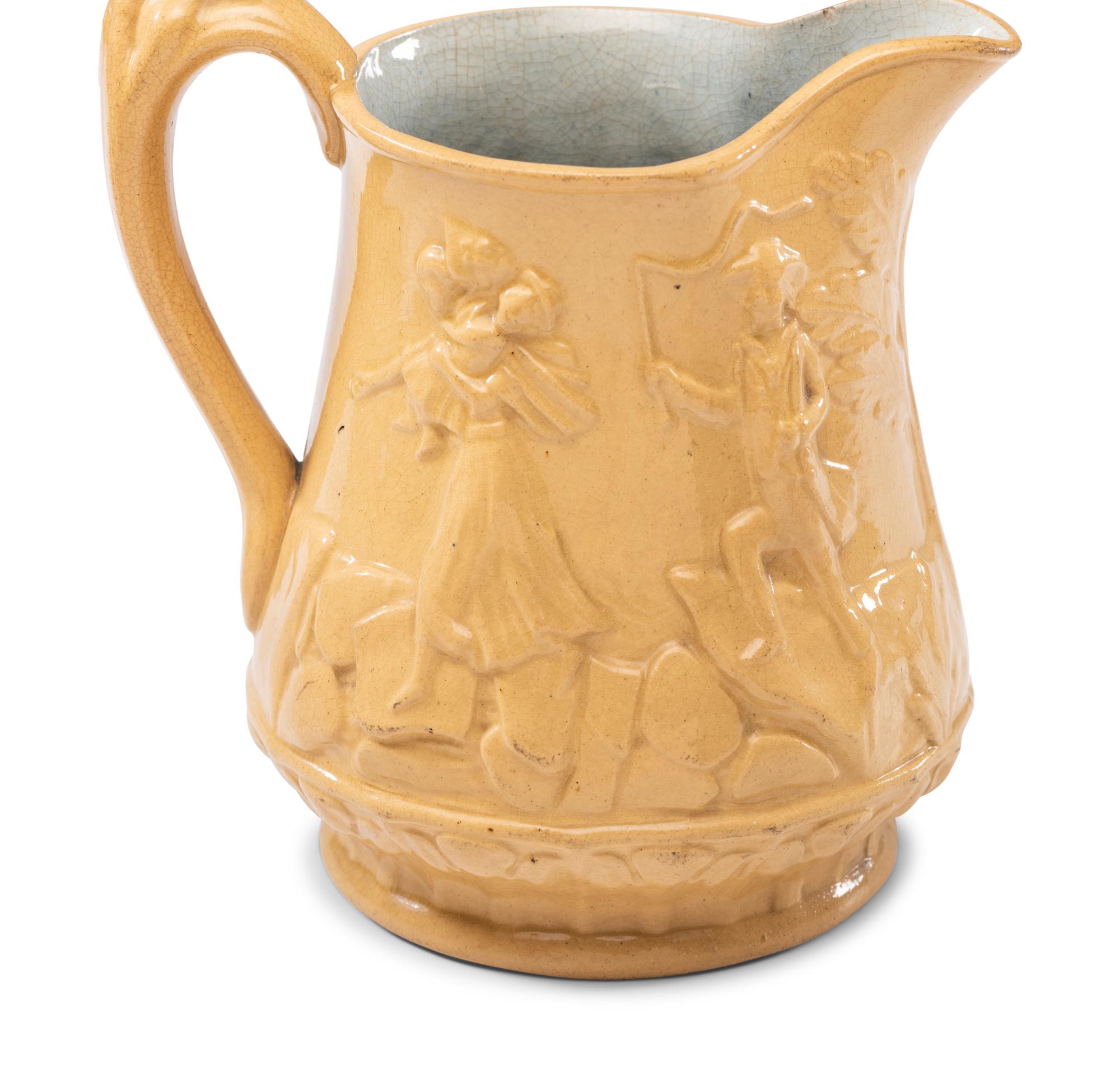 Five Graduated Abolitionist Yellowware Pitchers with Molded Scenes from Uncle Tom's Cabin