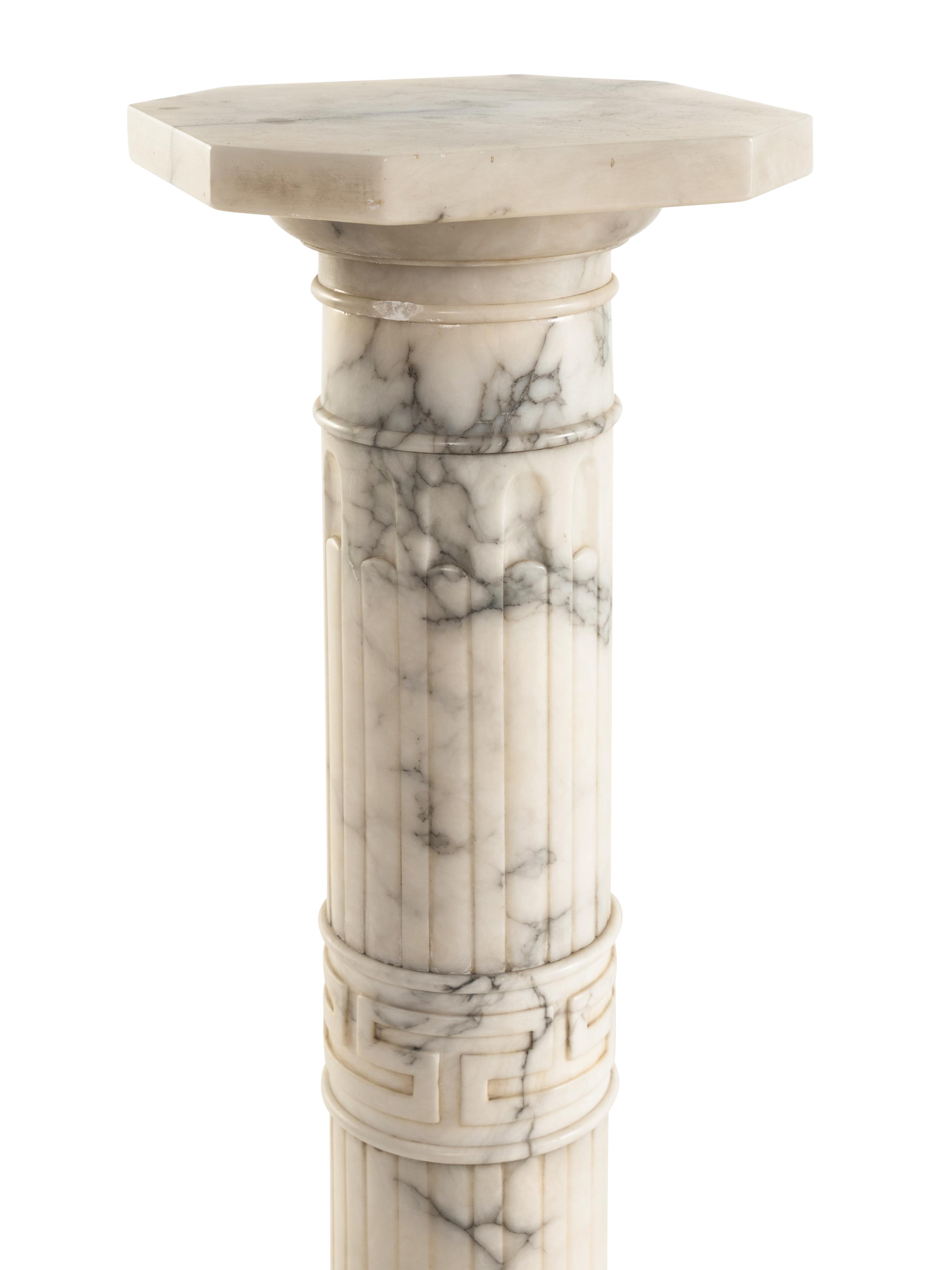 A Continental Carved Marble Pedestal