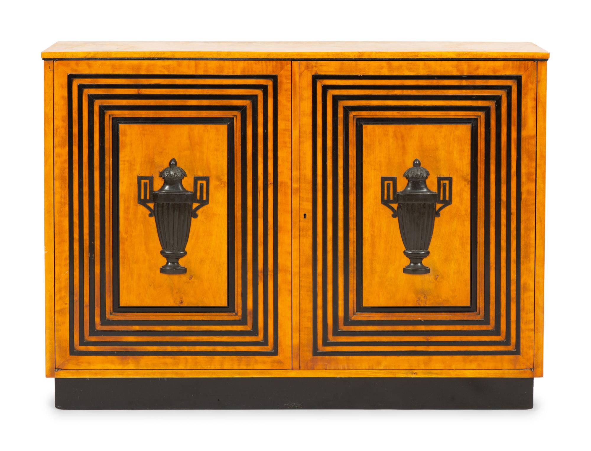 A Neoclassical Style Fruitwood and Parcel Ebonized Console Cabinet
