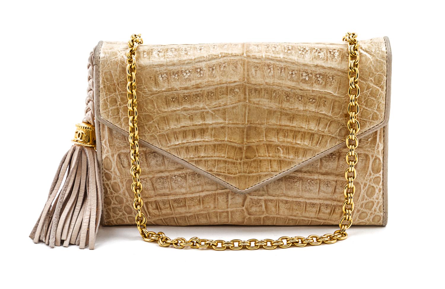 A Chanel Ivory Exotic Skin Convertible Flap Bag, 7 x 5 x 1 1/2 inches.