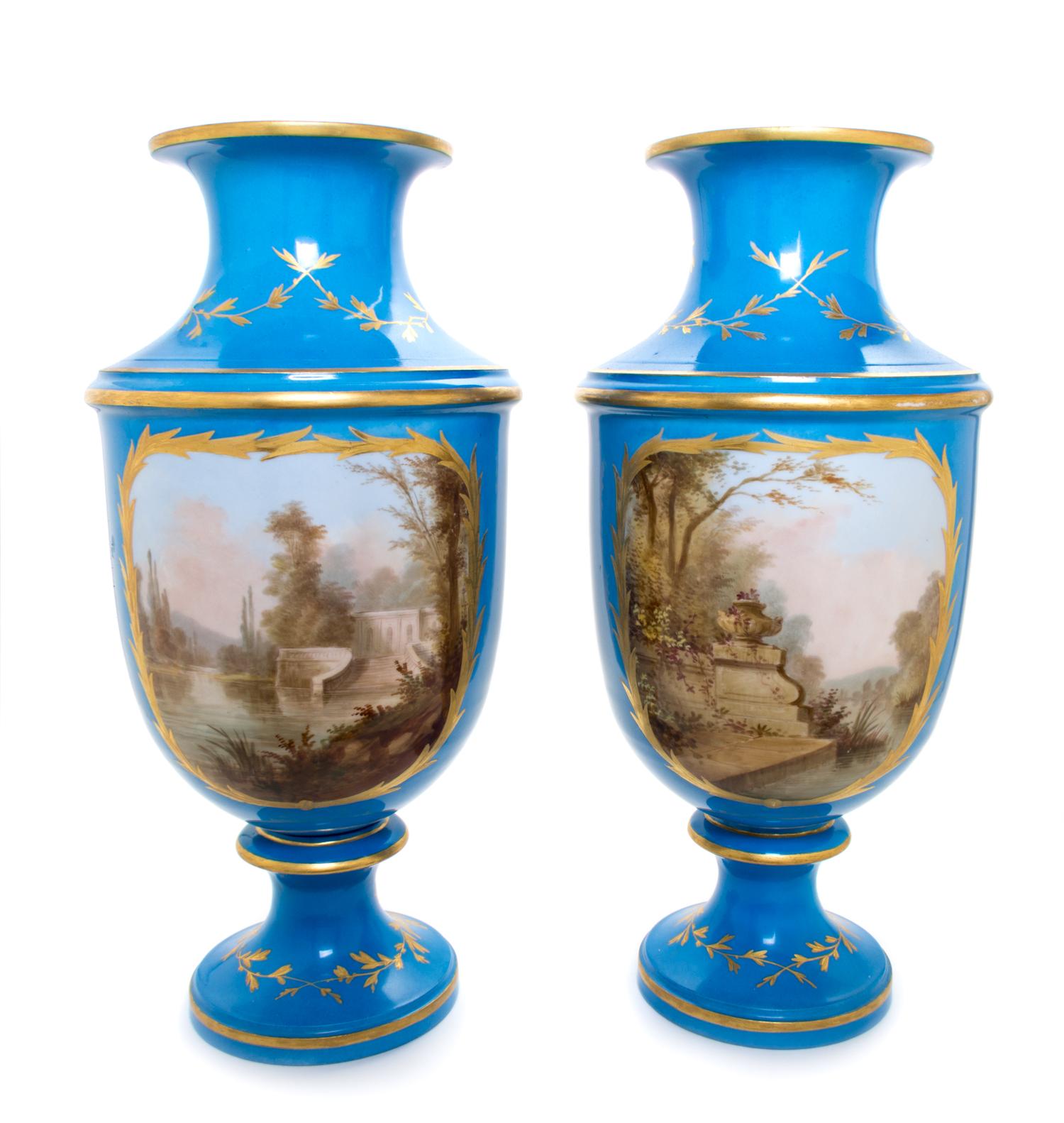 A Pair of Sevres Porcelain Vases Height 23 inches. — 19TH CENTURY