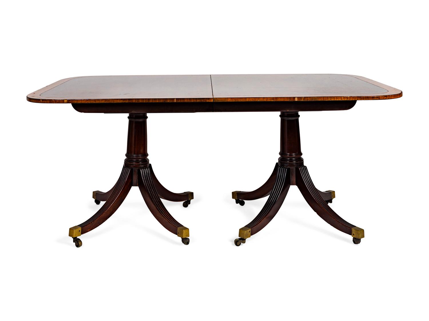 A George II Style Crossbanded Mahogany Two-Pedestal Table — 20TH CENTURY