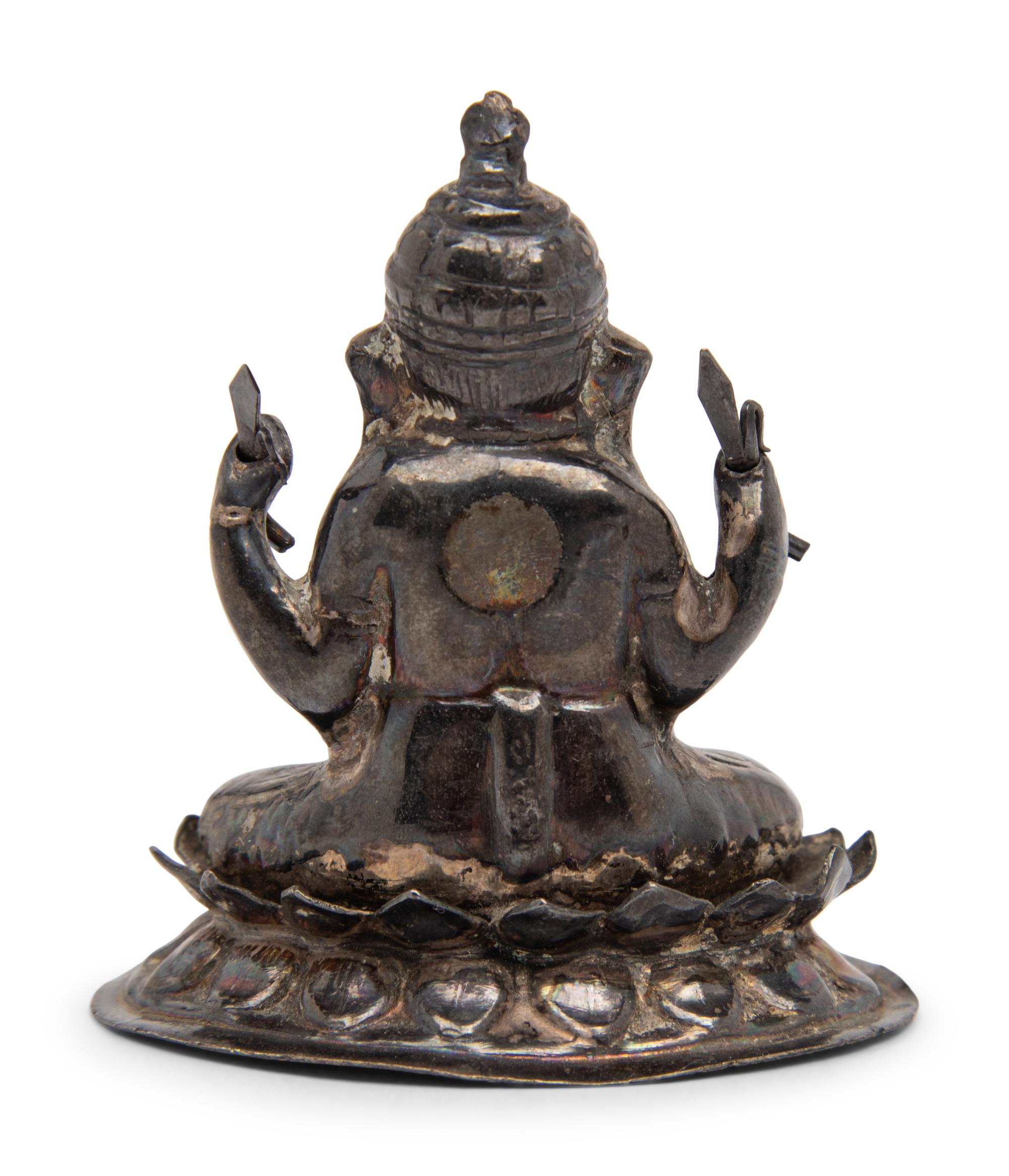 A Small Southeast Asian Silvered Metal Figure of Ganesha