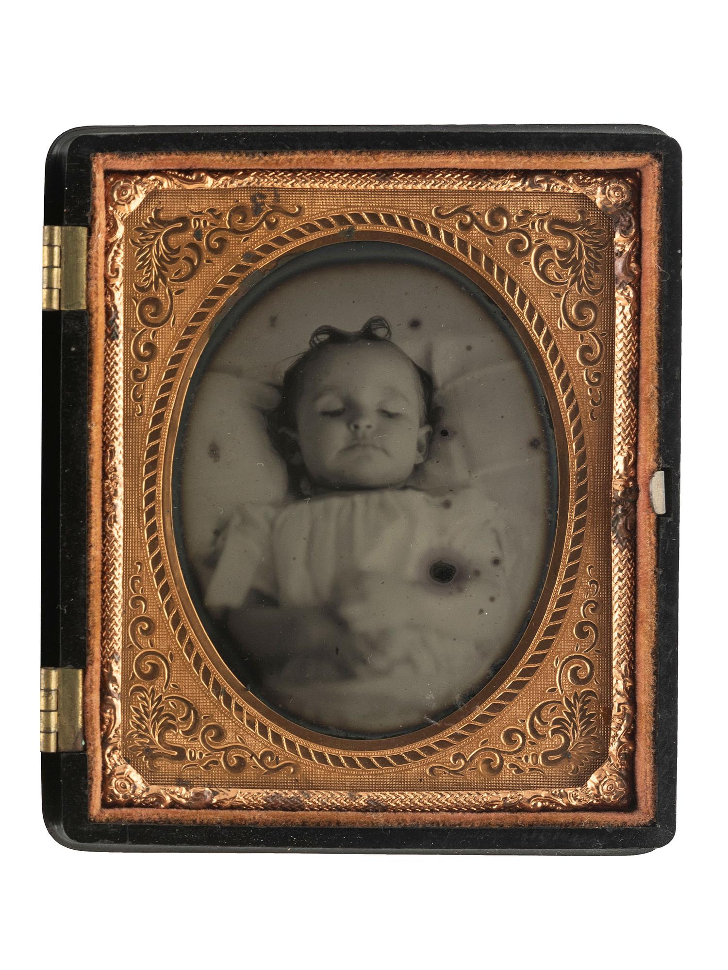 [EARLY PHOTOGRAPHY]. A pair of post-mortem tintypes of children, comprising: