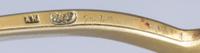 A Russian Silver-Gilt and Enamel Serving Spoon, Mark of Antip Kuzmichev, Moscow, late 19th/early 20th century, the handle and bowl inte