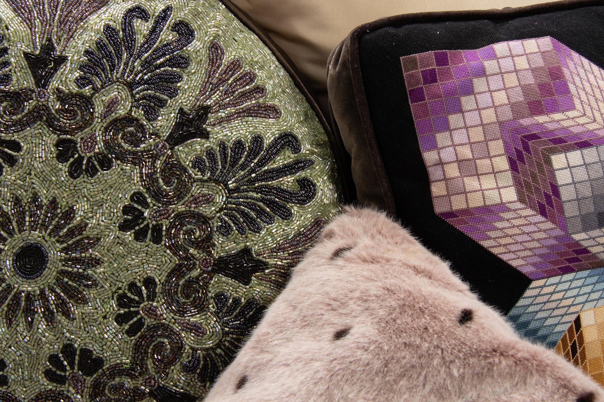 A Group of Nine Decorative Throw Pillows