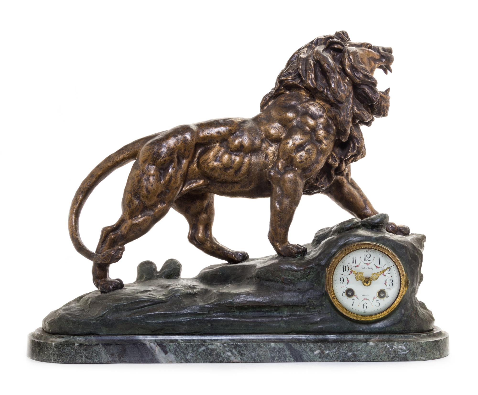A French Cast Metal Mantel Clock Height 17 inches. — MOVEMENT BY DELORME & CIE, CIRCA 1900