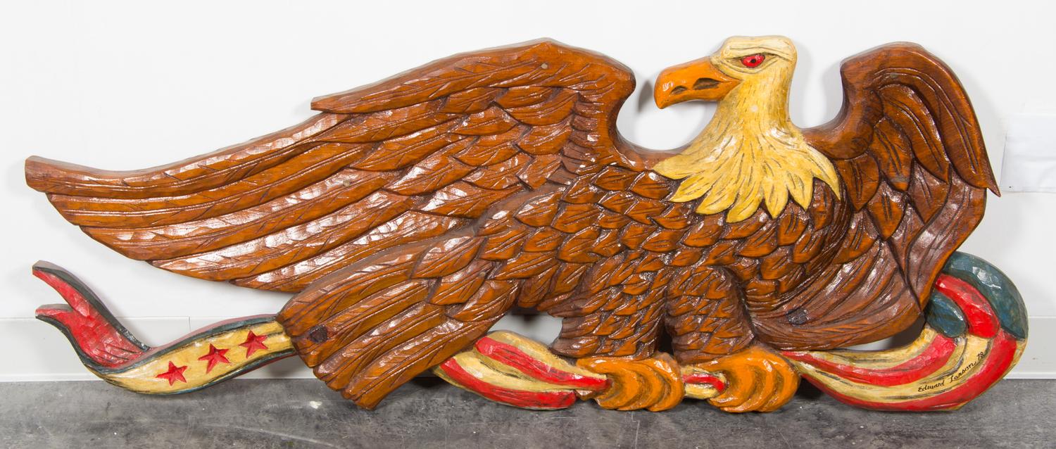 A Polychrome Carved Wood Wall Hanging Width 56 1/2 inches.