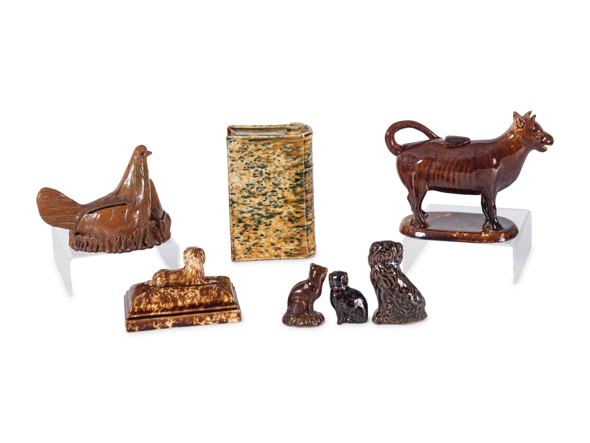 Seven Figural Bennington Style and Redware Articles
