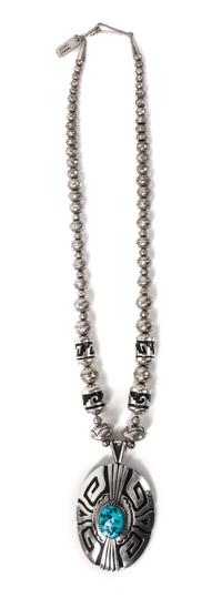 A Navajo Silver and Turquoise Pendant and Bead Necklace, Tommy Singer Length 12 inches; height of pendant 3 1/4 x width 2 inches.