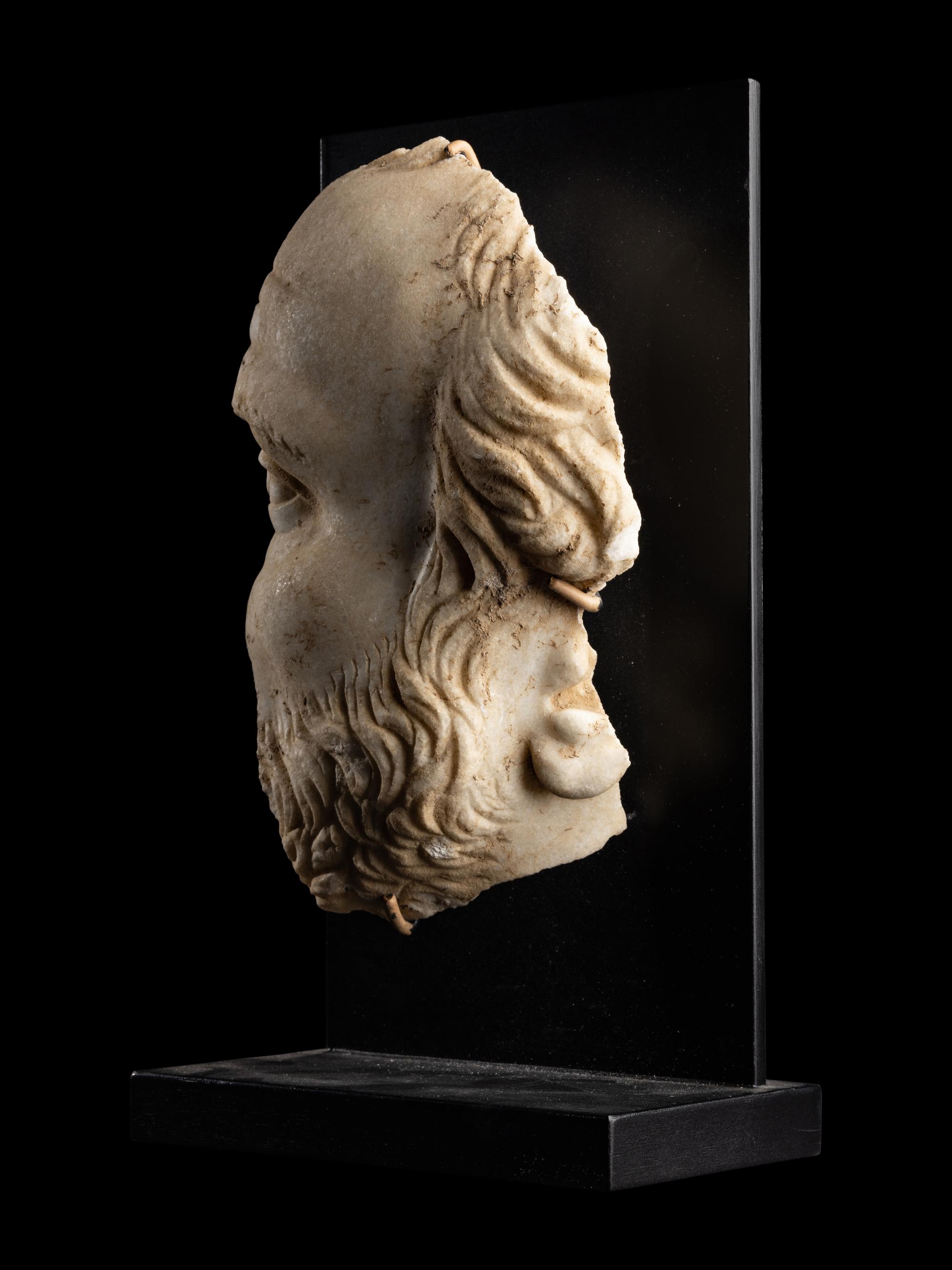 A Roman Marble Fragmentary Portrait Head of a Man