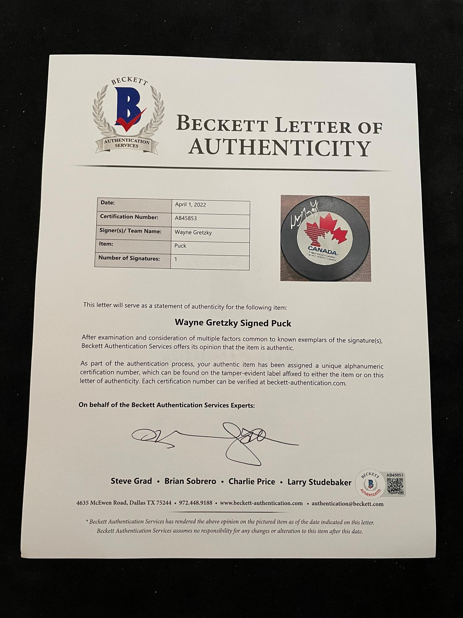 A Wayne Gretzky Signed Autograph Canada Hockey Puck (Beckett Authentication Services Letter BAS Certified),