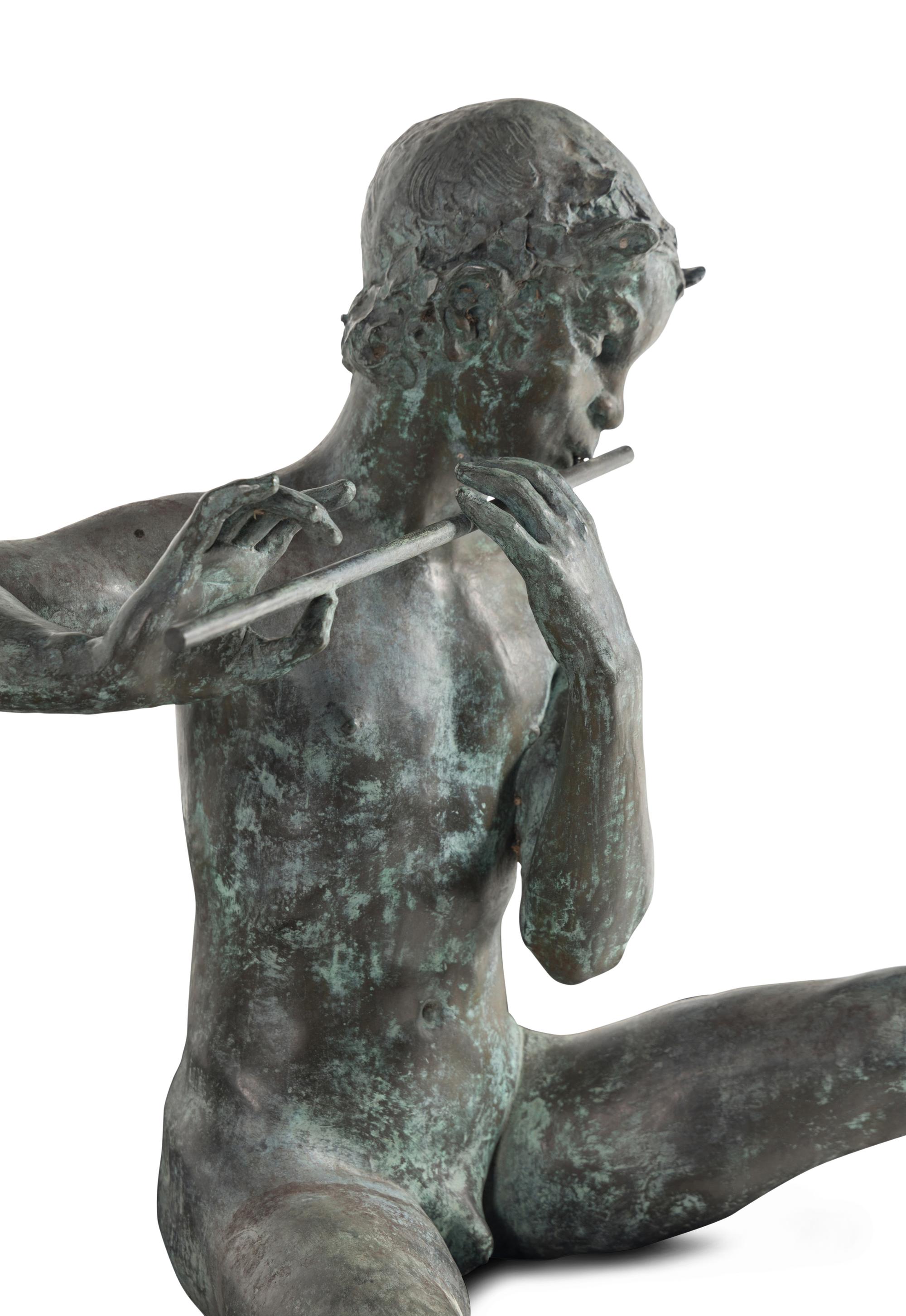 A Patinated Bronze Figure of Pan