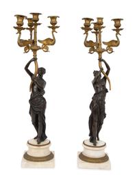 A Pair of French Empire Style Gilt and Patinated Bronze Figural Four-Light Candelabra