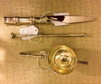 An American Silver Three-Piece Bar Set, Tiffany & Co., New York, NY, each having bamboo-form handles, comprising a bar knife, measure a