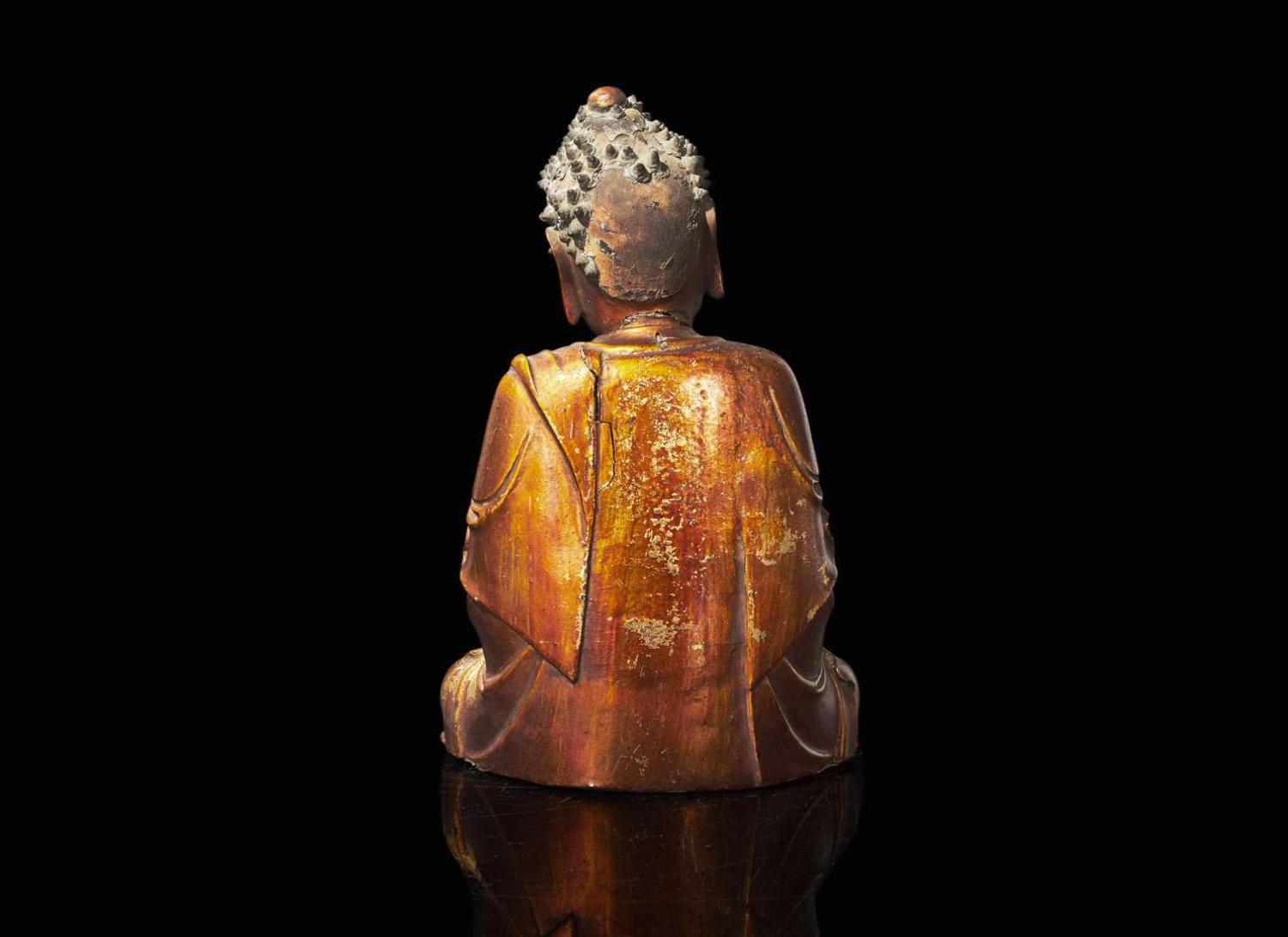 A Chinese gilt lacquered figure of Buddha, Ming to Qing dynasty 木漆金佛造像一座 明或清