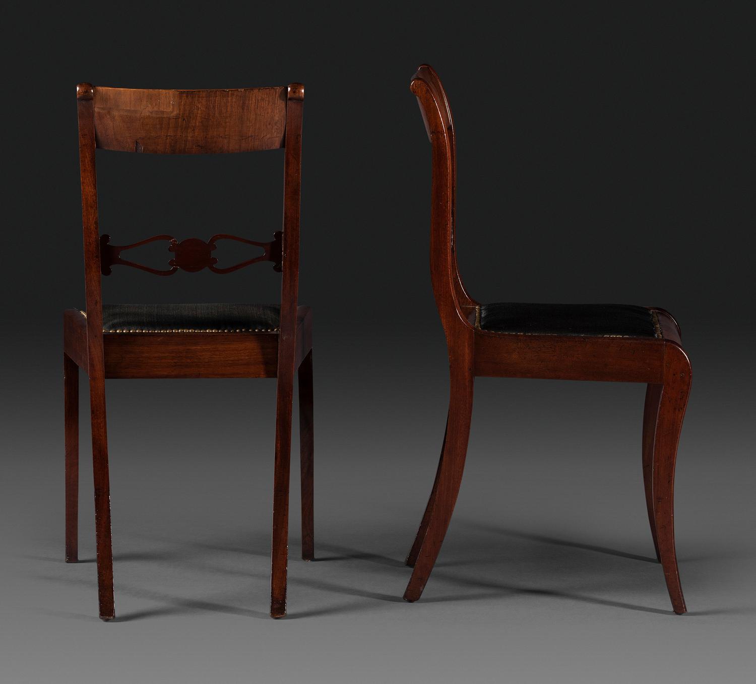 A Pair of Classical Figured and Carved Mahogany Klismos Side Chairs