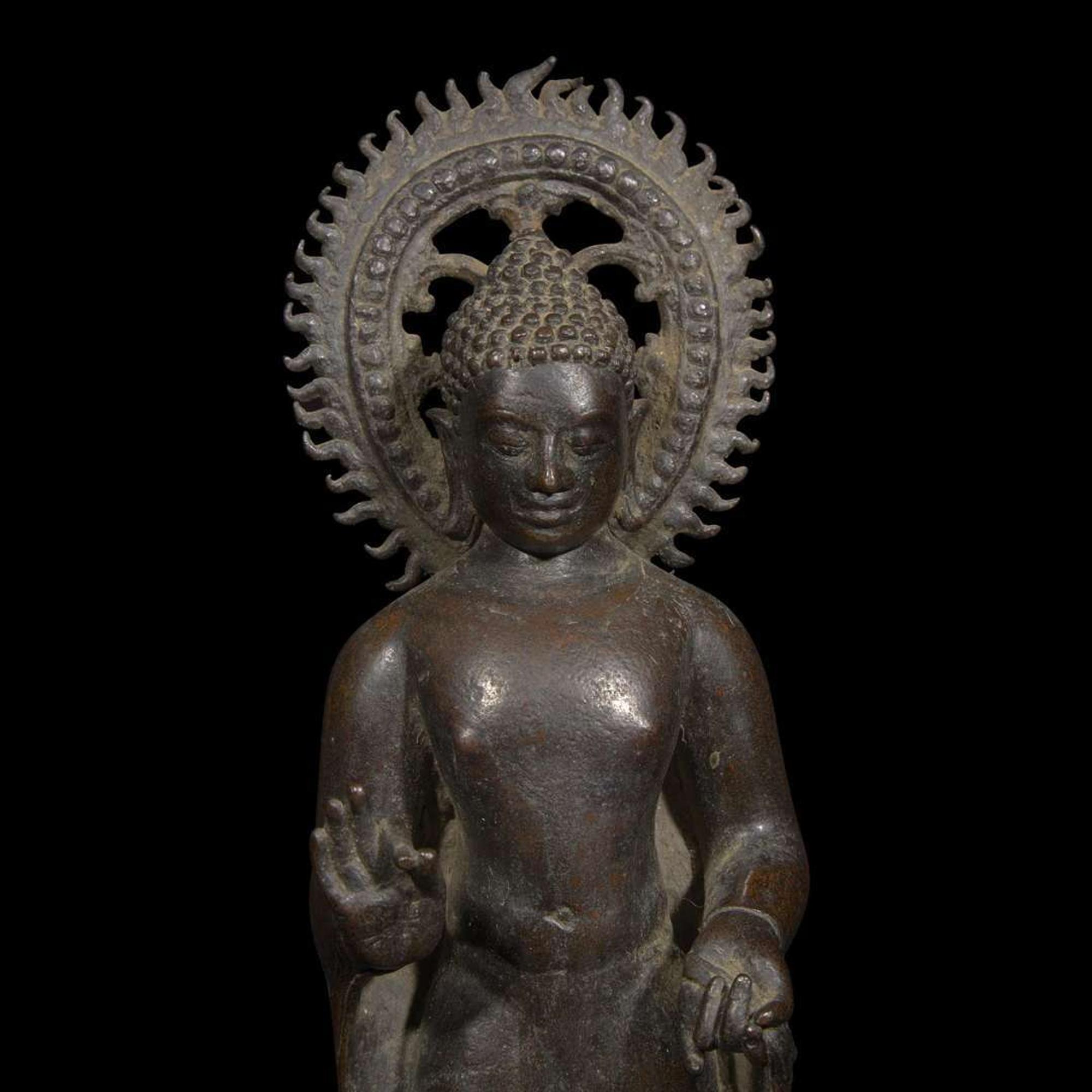 A patinated bronze figure of a standing Buddha 青銅佛造像 9th to 11th Century, possibly Javanese, ??????,?????