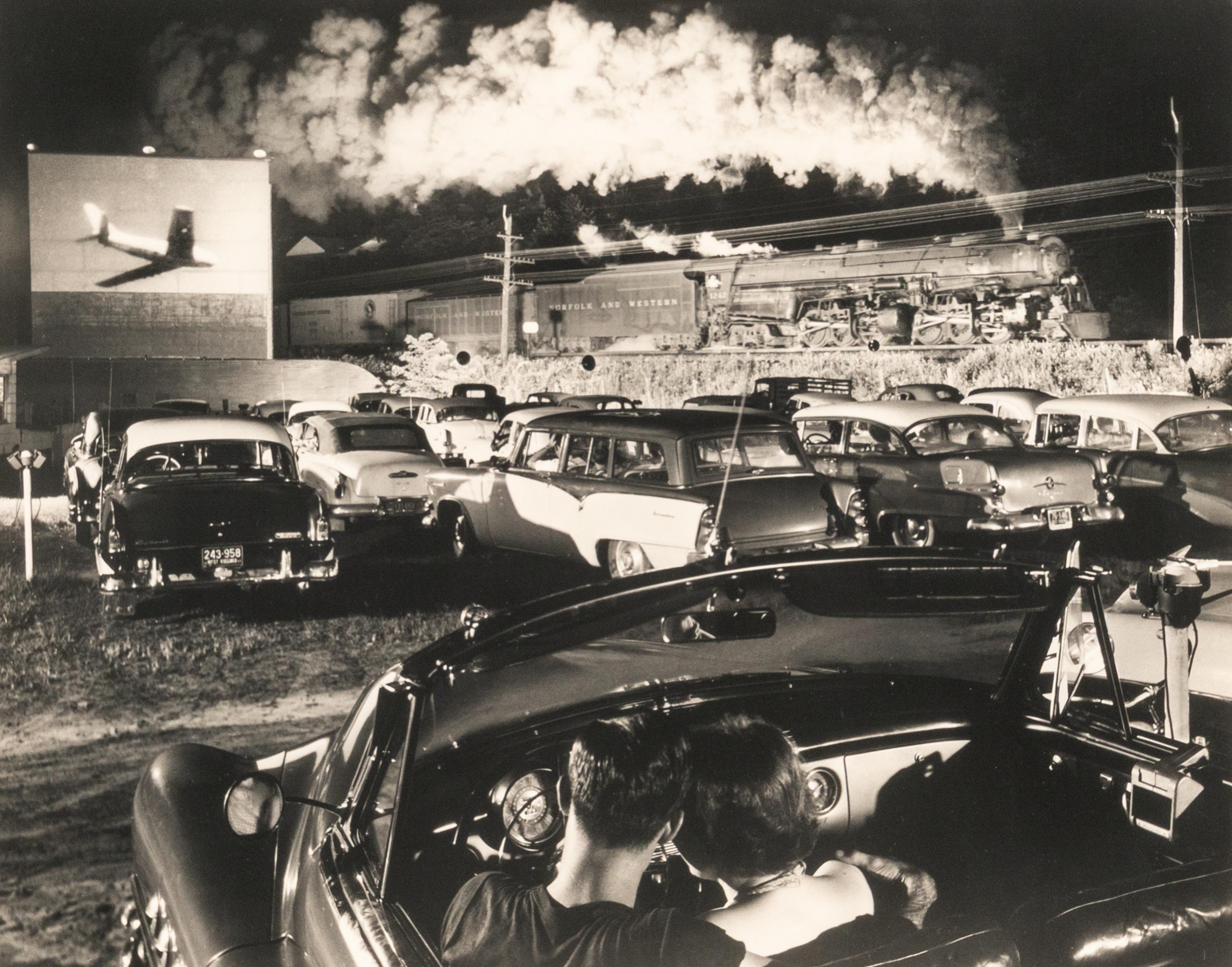 O. Winston Link (American, 1914-2001) — Hot Shot Eastbound at the Iaeger Drive-In, Iaeger, West Virginia, 1956; printed 1986