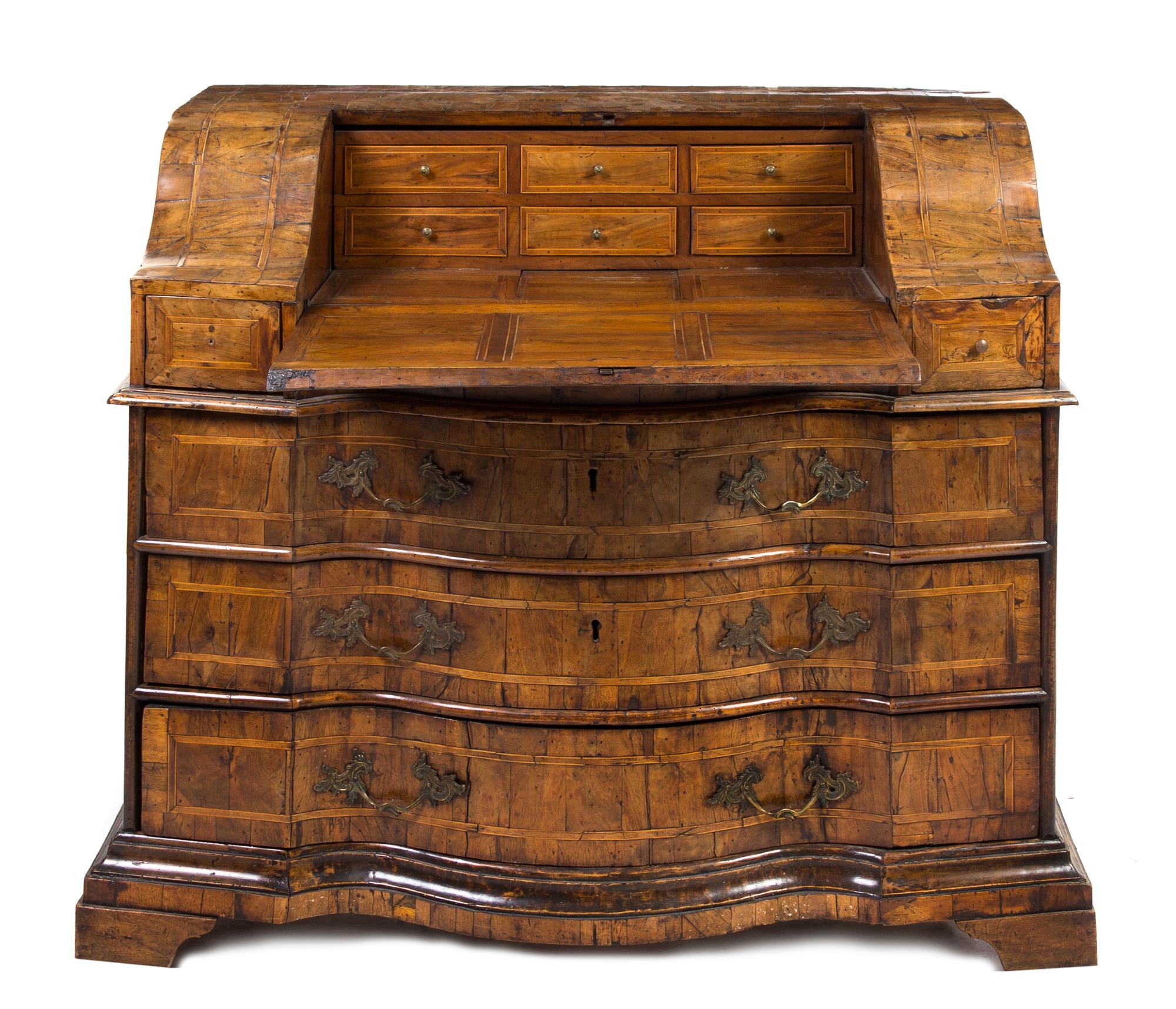 An Austrian Burlwood, Walnut and Parquetry Bureau, Height 41 x width 47 3/4 x depth 23 1/2 inches.