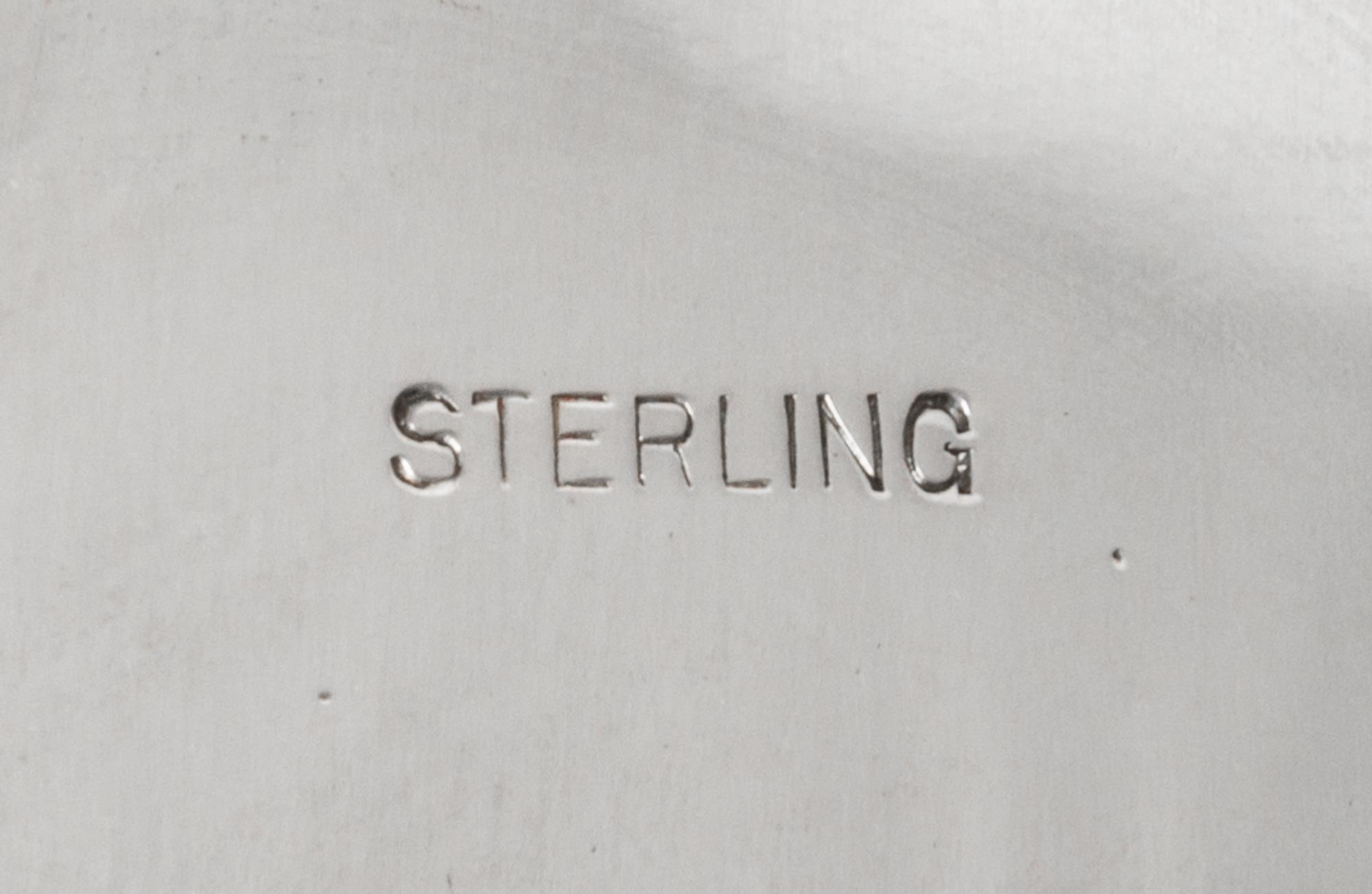 An American Silver Pierced Serving Tray, Mt. Vernon Co. Silversmiths Inc., Mount Vernon, NY, 1914-1923, of circular form, the border de