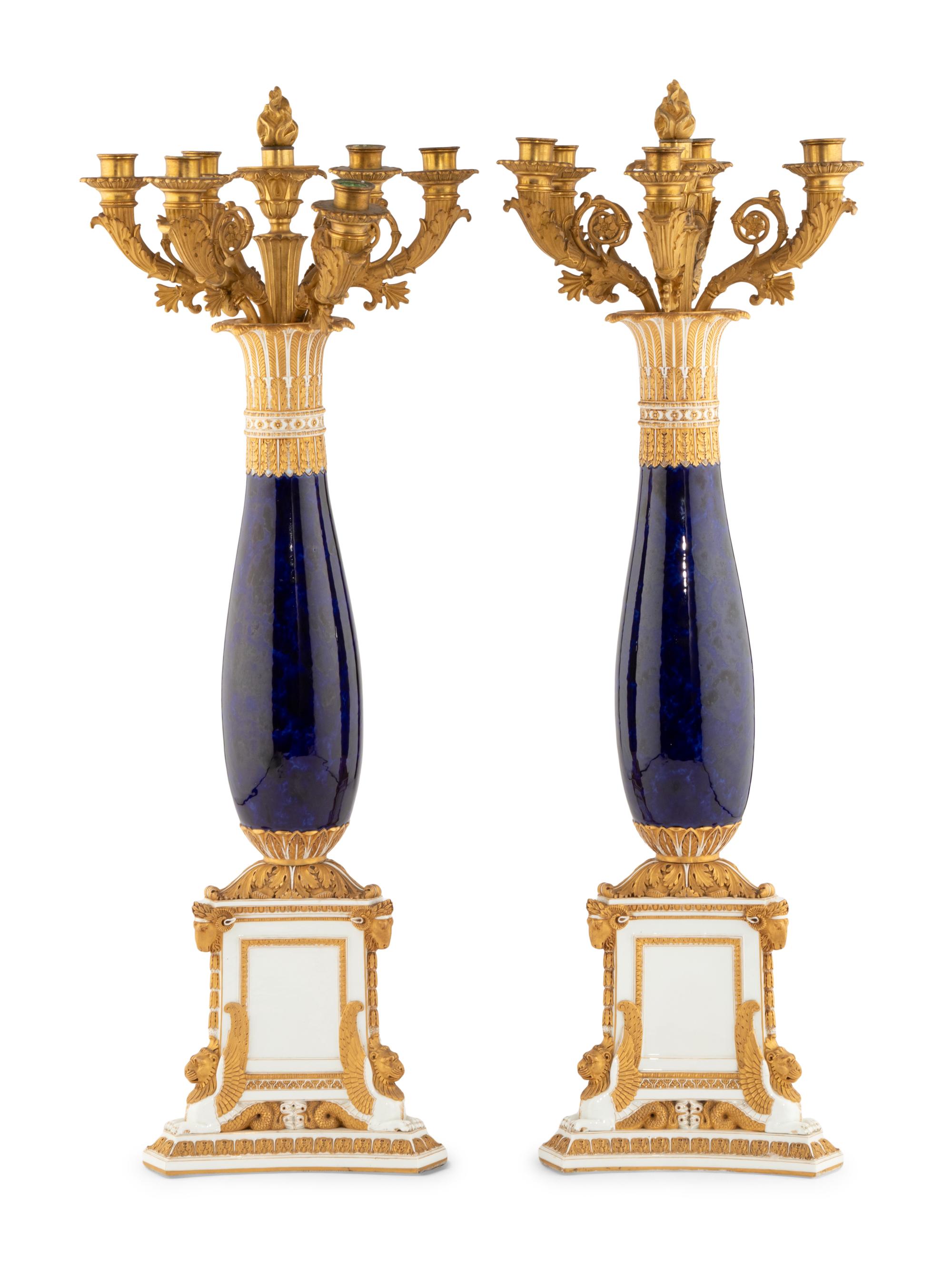 A Pair of Empire Gilt Bronze Mounted Porcelain Six-Light Candelabra