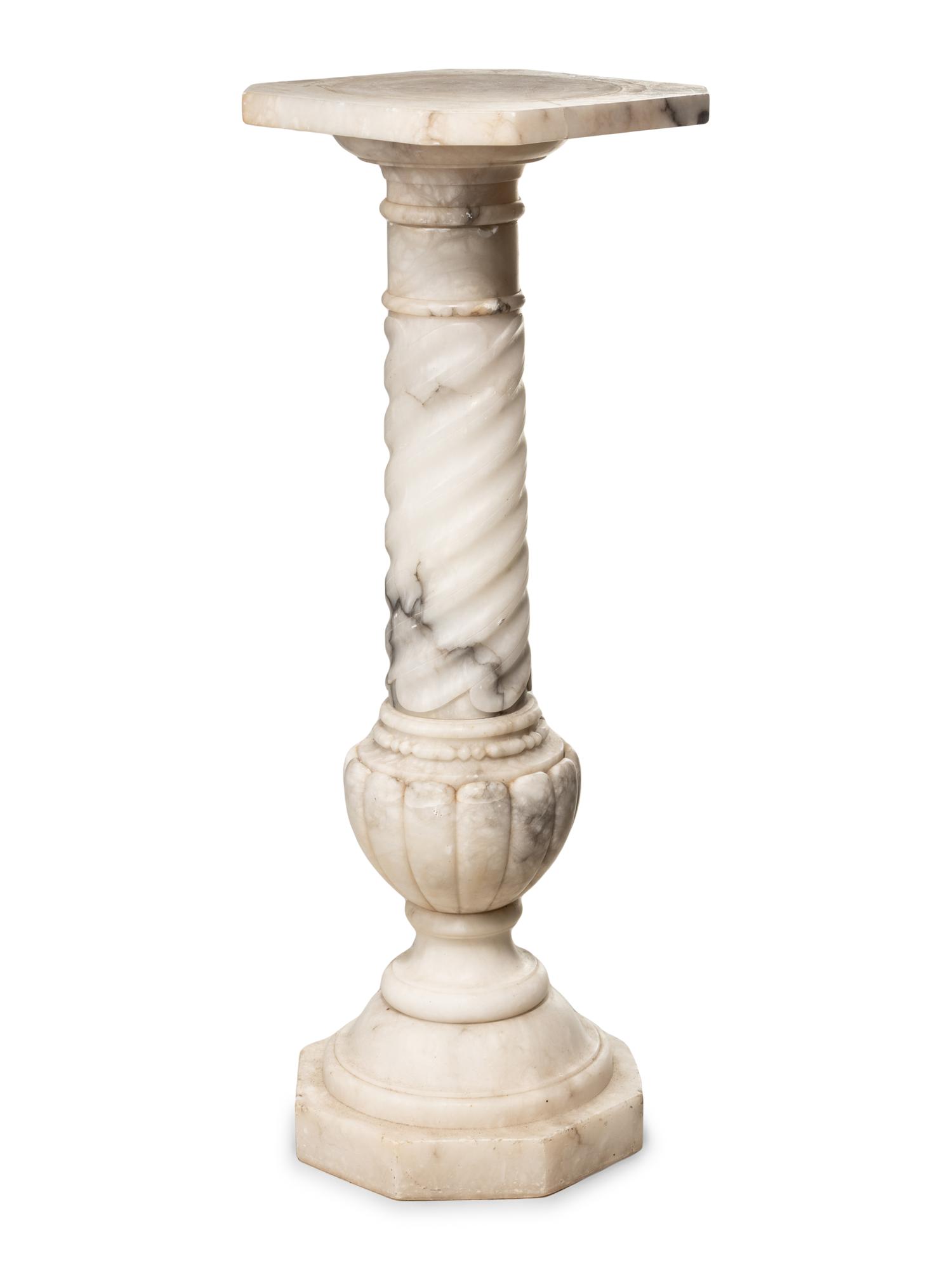 A Continental Carved Marble Pedestal
