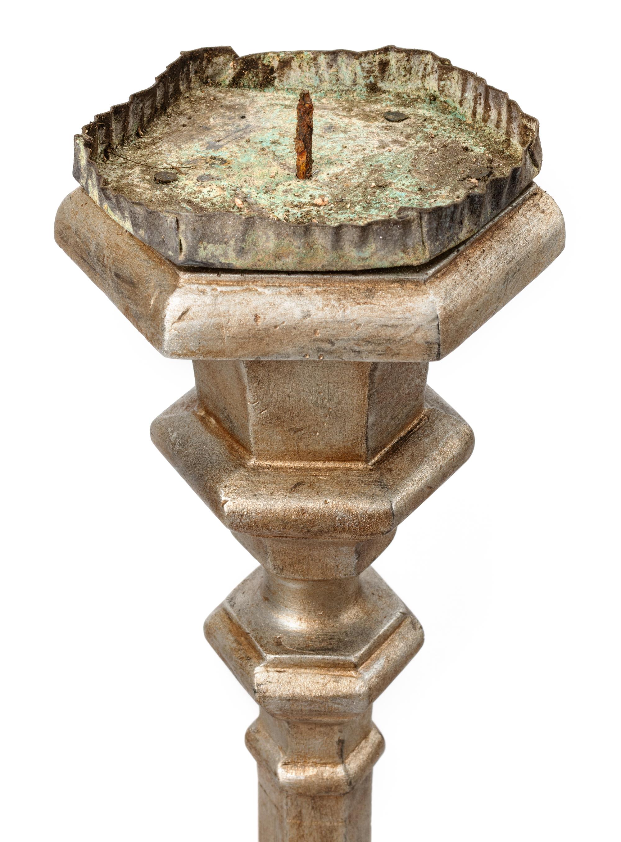 A Set of Four Northern European Gilt and Silvered Wood Candlesticks