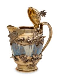 A French Art Nouveau Silver Mounted Stoneware Creamer