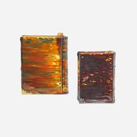 Two Rockingham or flint enamel glazed yellowware book-form flasks Probably Lyman Fenton & Co., Bennington, VT, circa 1850
