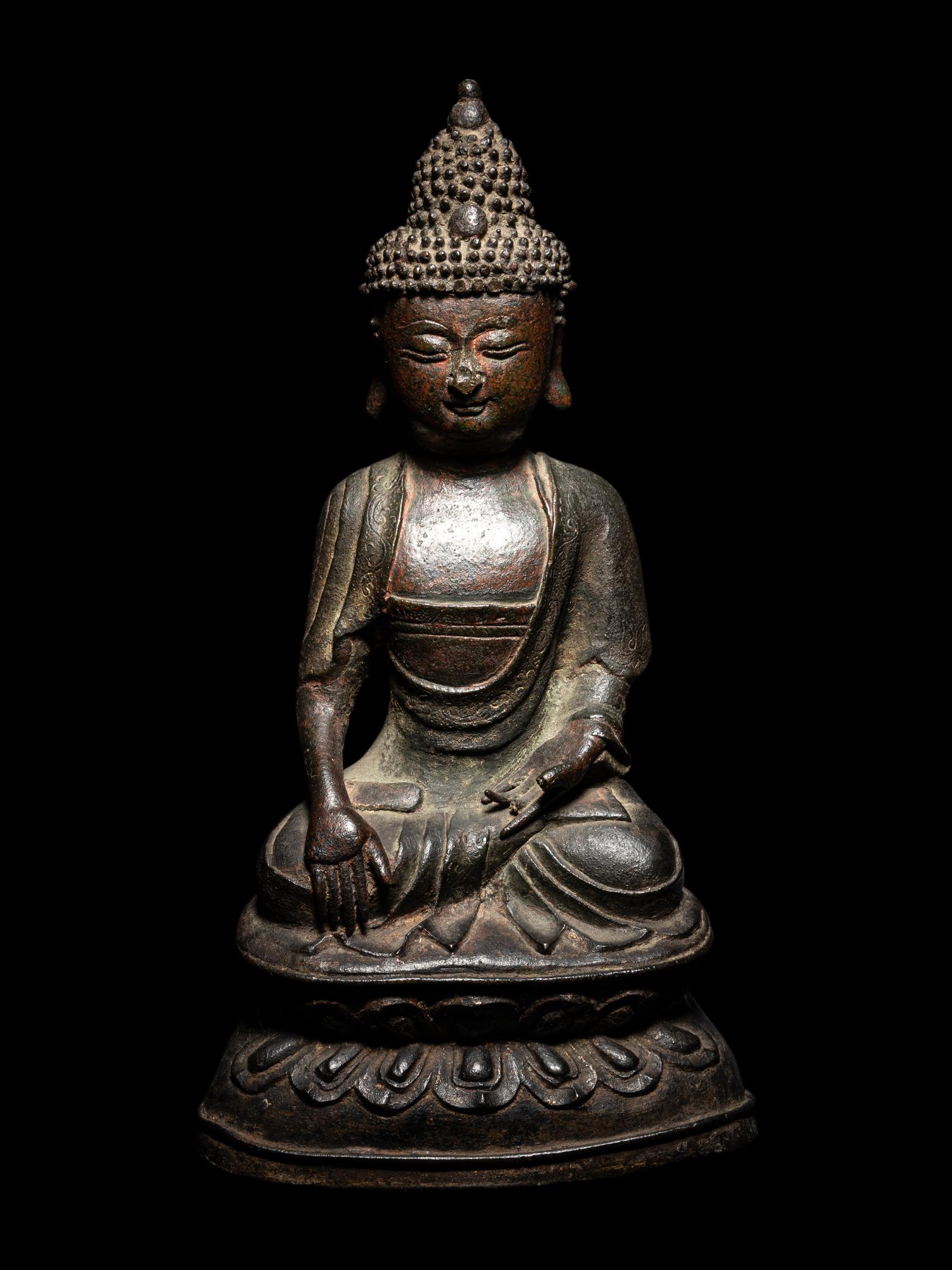 A Bronze Figure of Seated Buddha