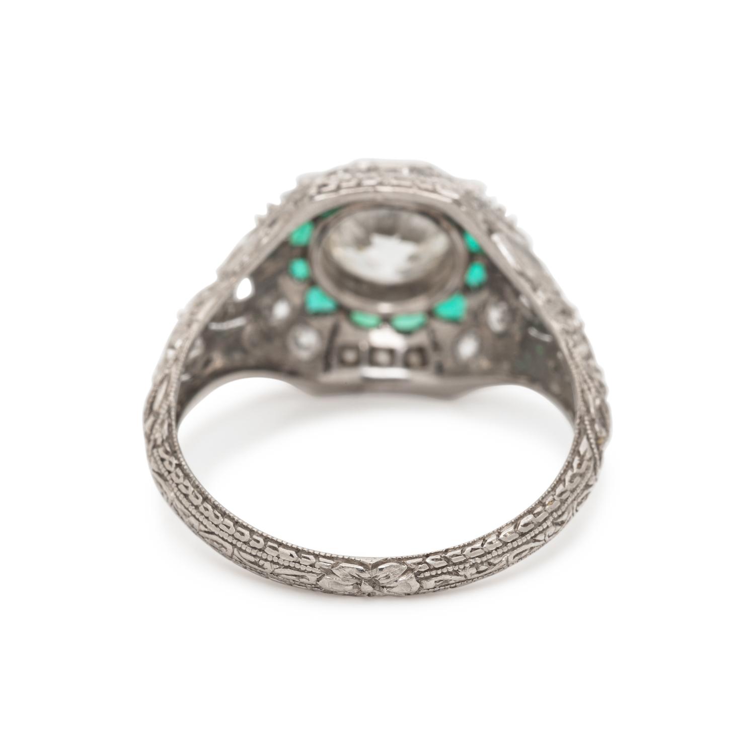 ART DECO, PLATINUM, DIAMOND AND EMERALD RING