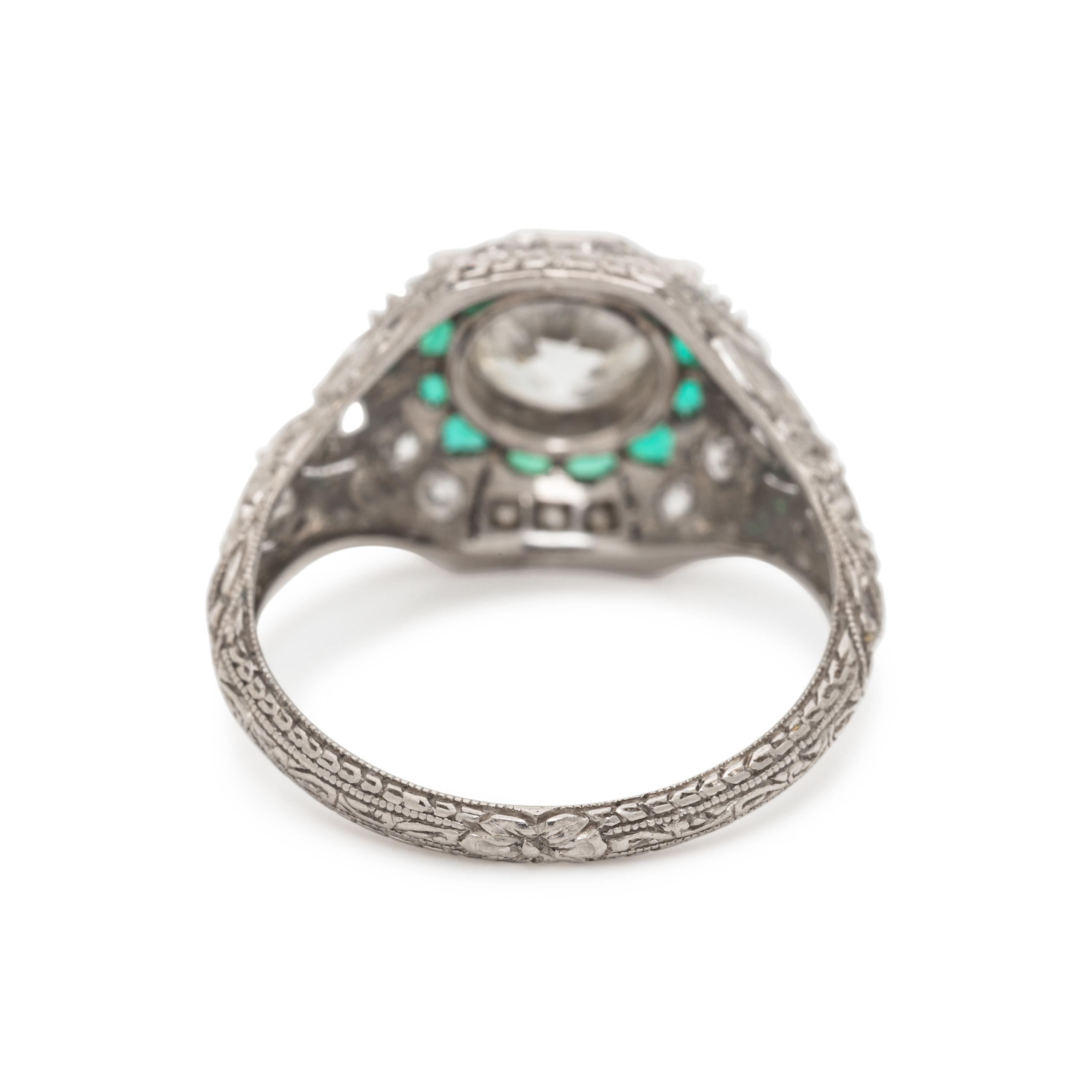 ART DECO, PLATINUM, DIAMOND AND EMERALD RING