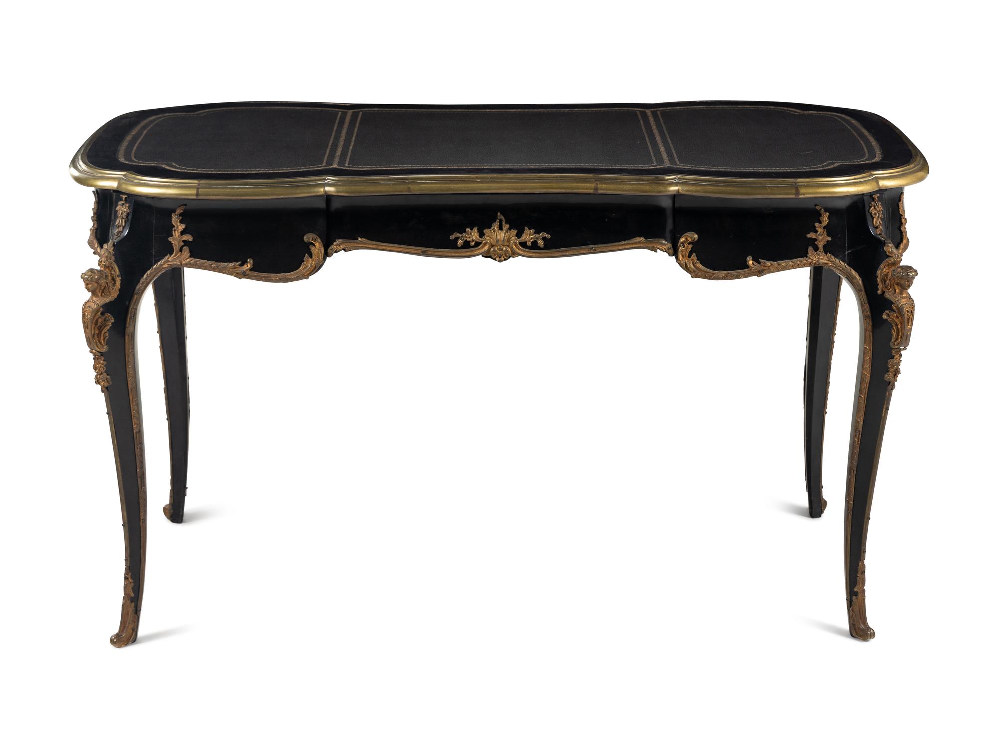 A Louis XV Style Gilt-Metal Mounted Ebonized Bureau Plat