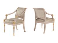 A Set of Six Neoclassical Carved and Parcel Gilt Dining Chairs