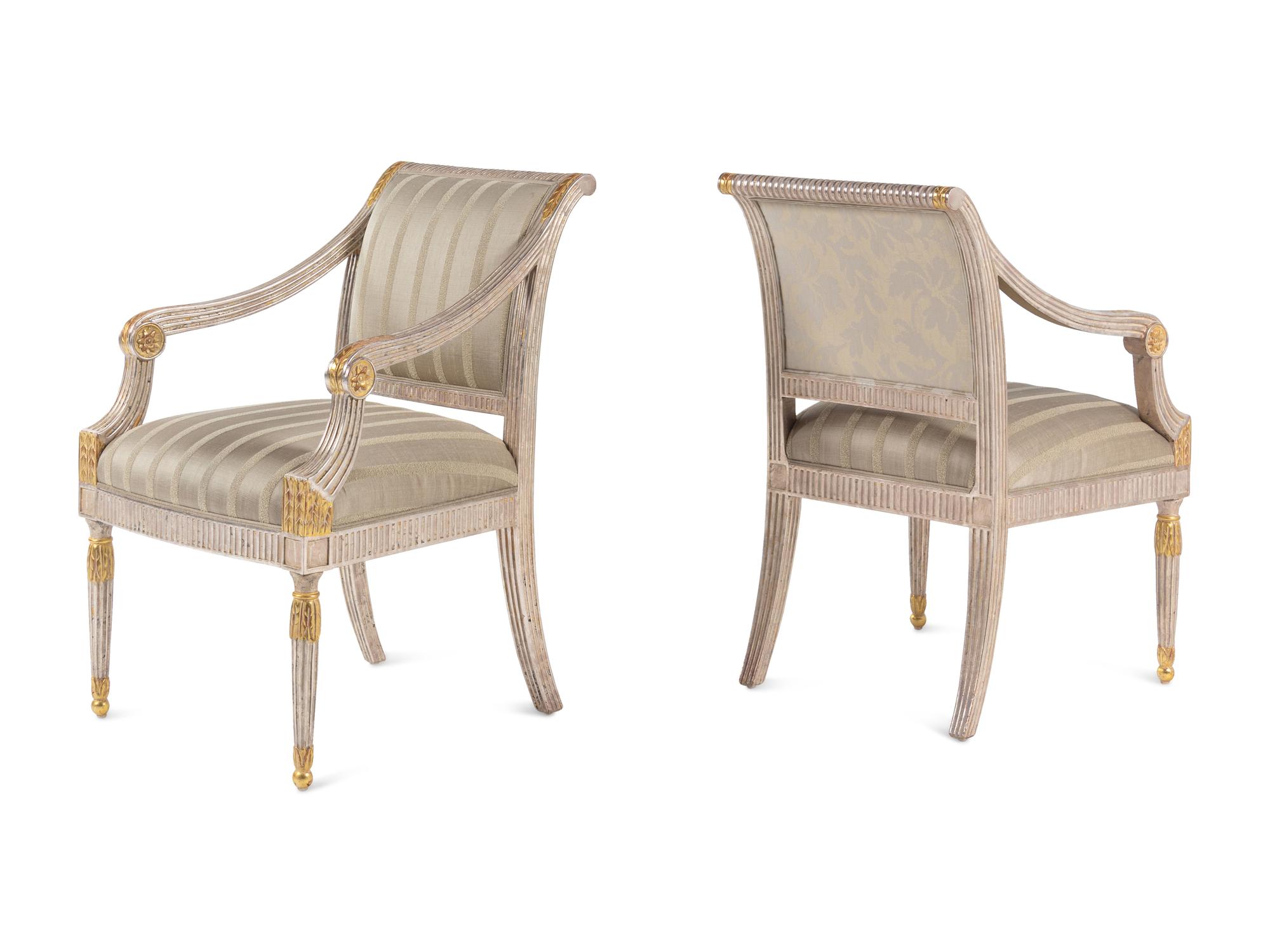 A Set of Six Neoclassical Carved and Parcel Gilt Dining Chairs