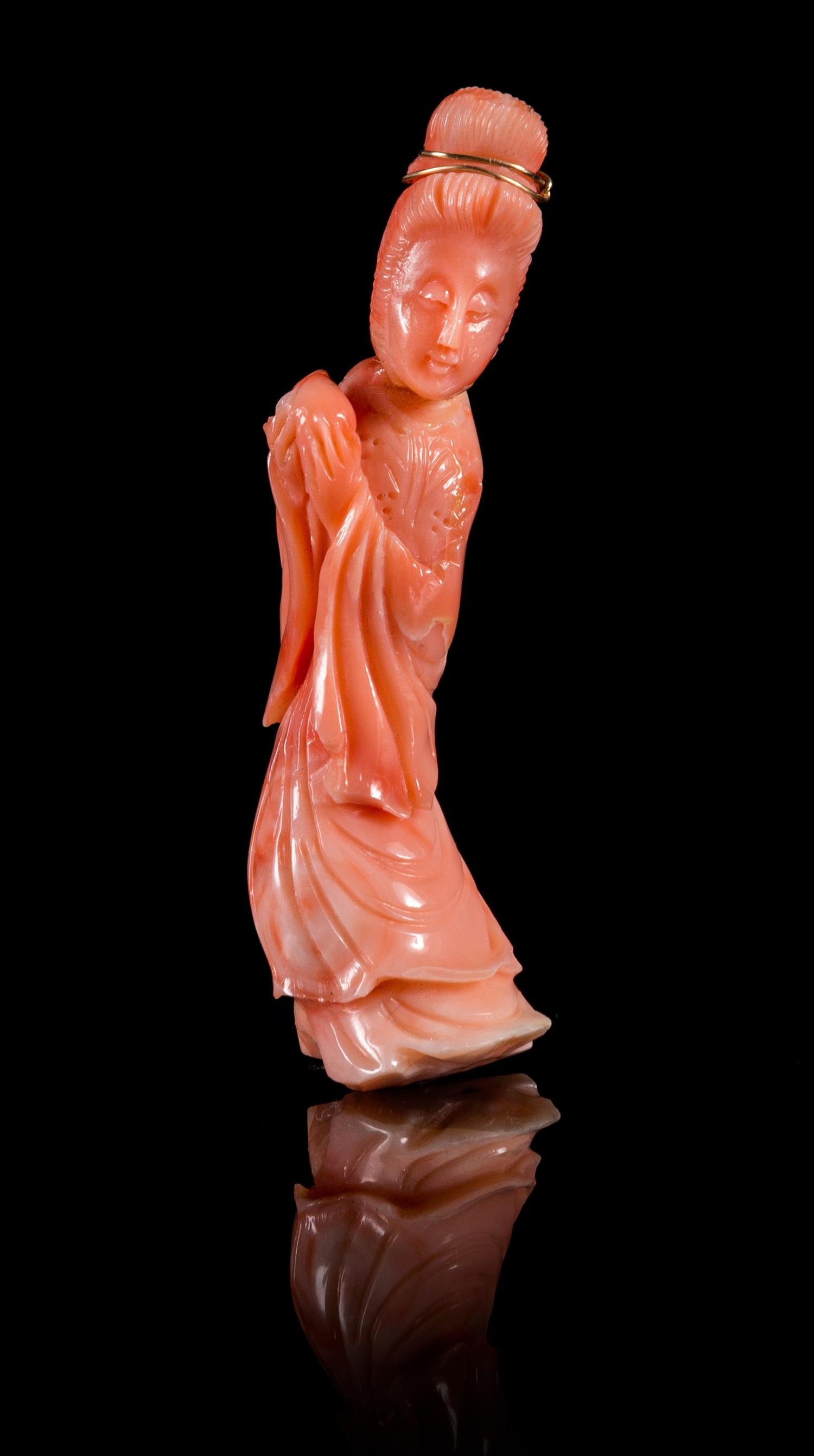 A Small Pink Coral Figure of a Lady Height 3 1/4 inches.