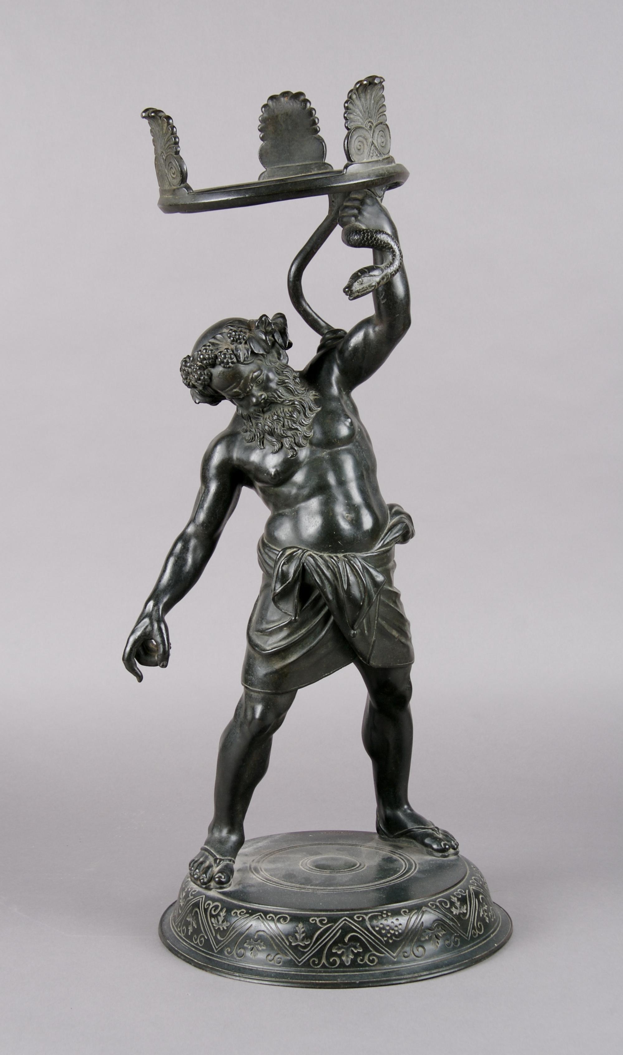 A Bronze Figure of a Mythical Figure, Height 24 inches.