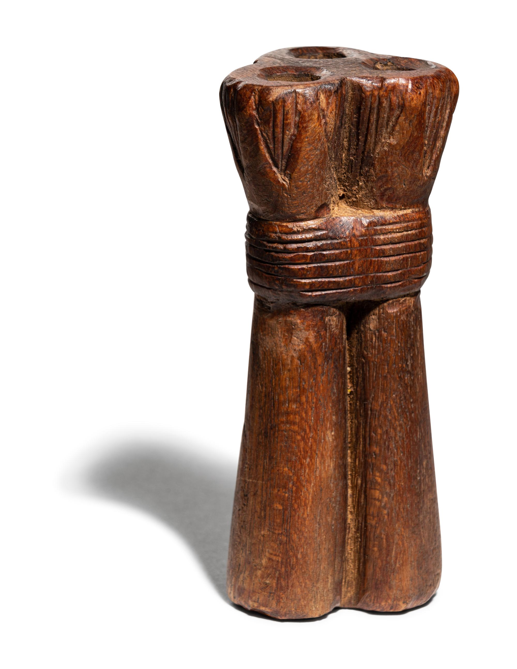 An Egyptian Wood Triple Tube Kohl Vessel