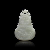A Chinese White Jade Double Gourd Form Plaque 白玉雙面童子圖葫蘆牌