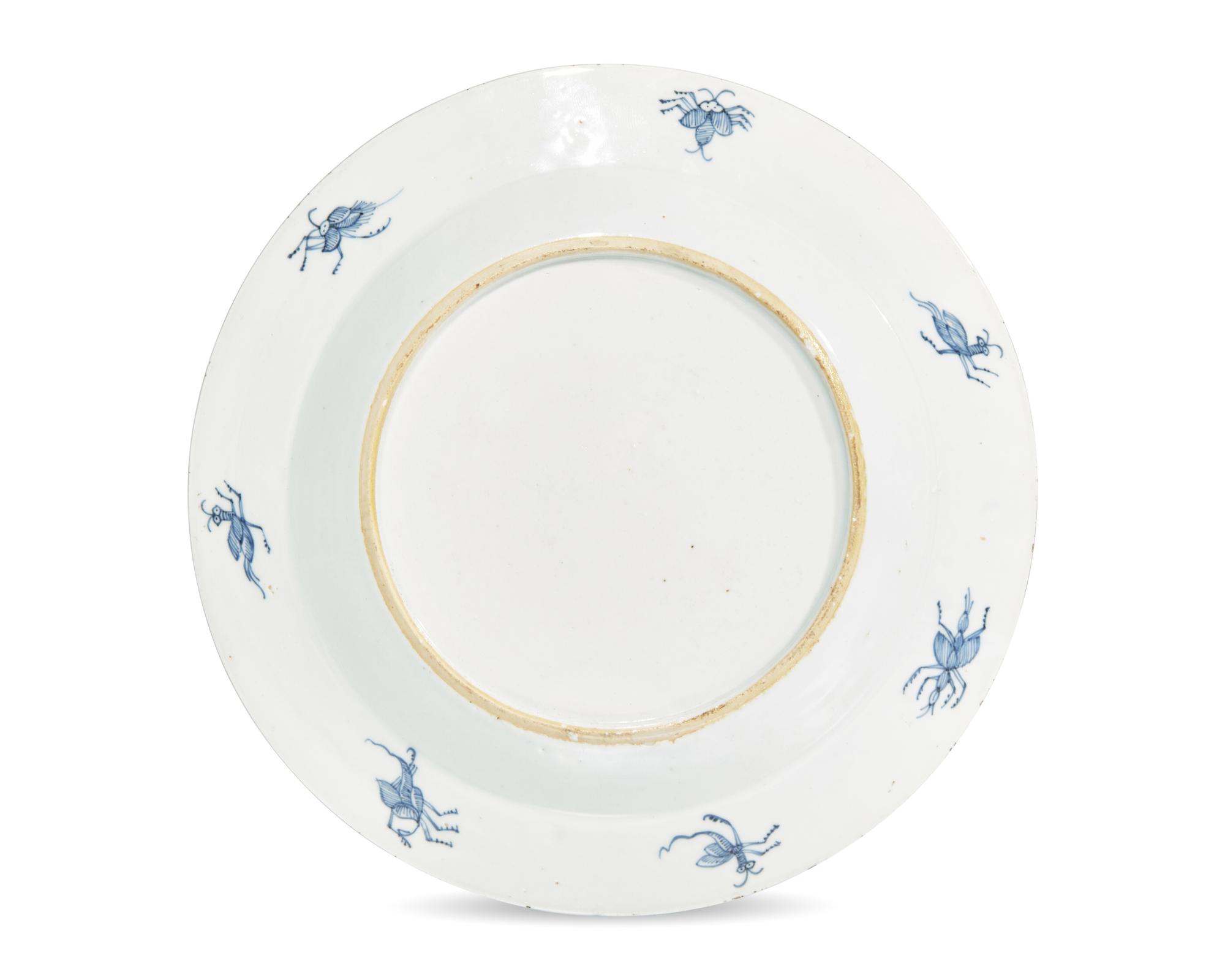A Chinese Export Porcelain Rouge-De-Fer Plate Depicting "La Dame Au Parasol"