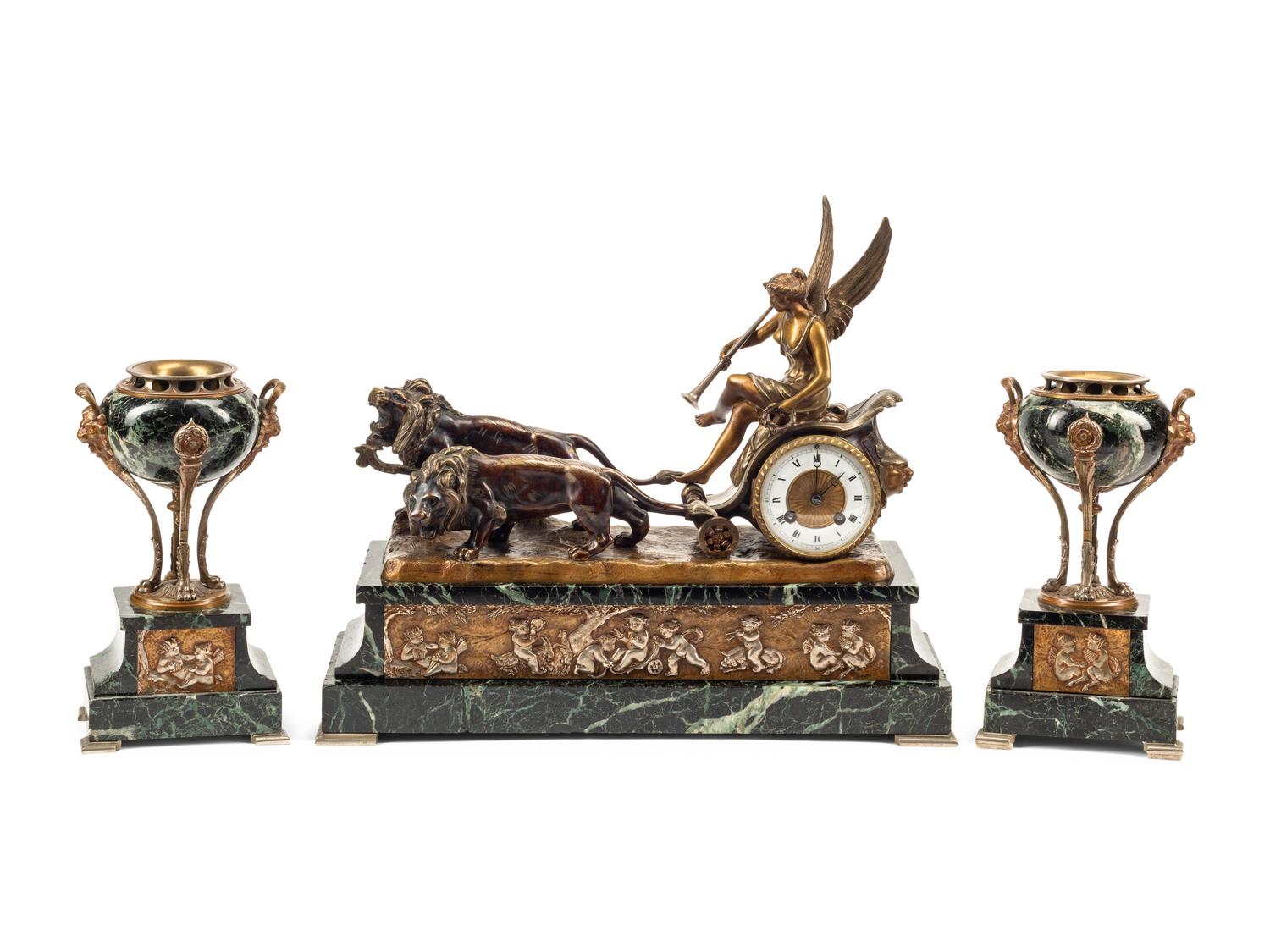 A French Bronze and Marble Clock Garniture
