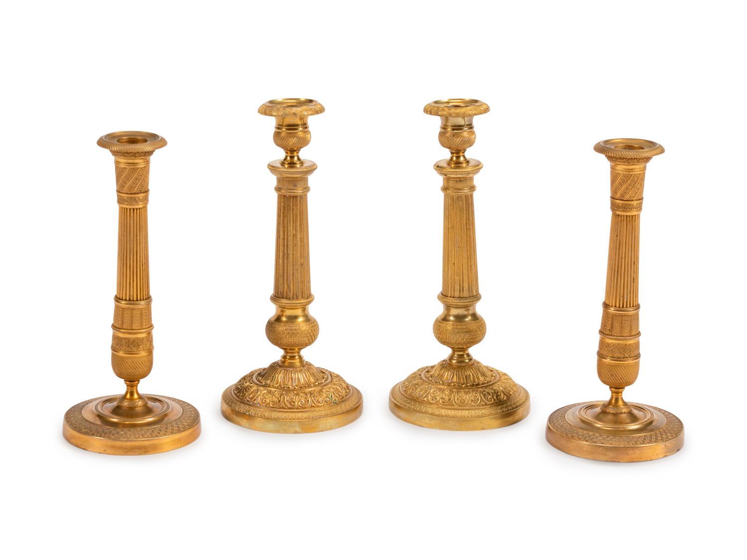 Two Pair of Charles X Gilt-Bronze Candlesticks — 19TH CENTURY