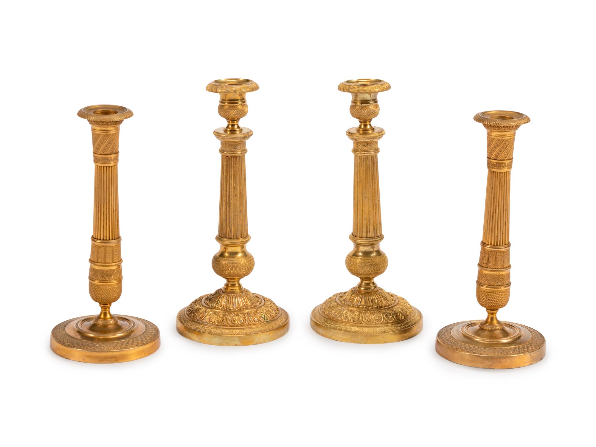 Two Pair of Charles X Gilt-Bronze Candlesticks — 19TH CENTURY