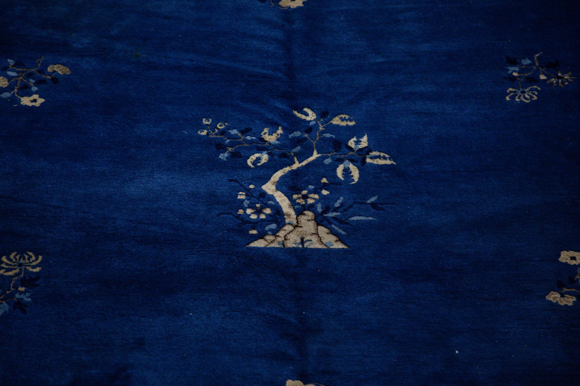 A Chinese Blue and White Wool Rug