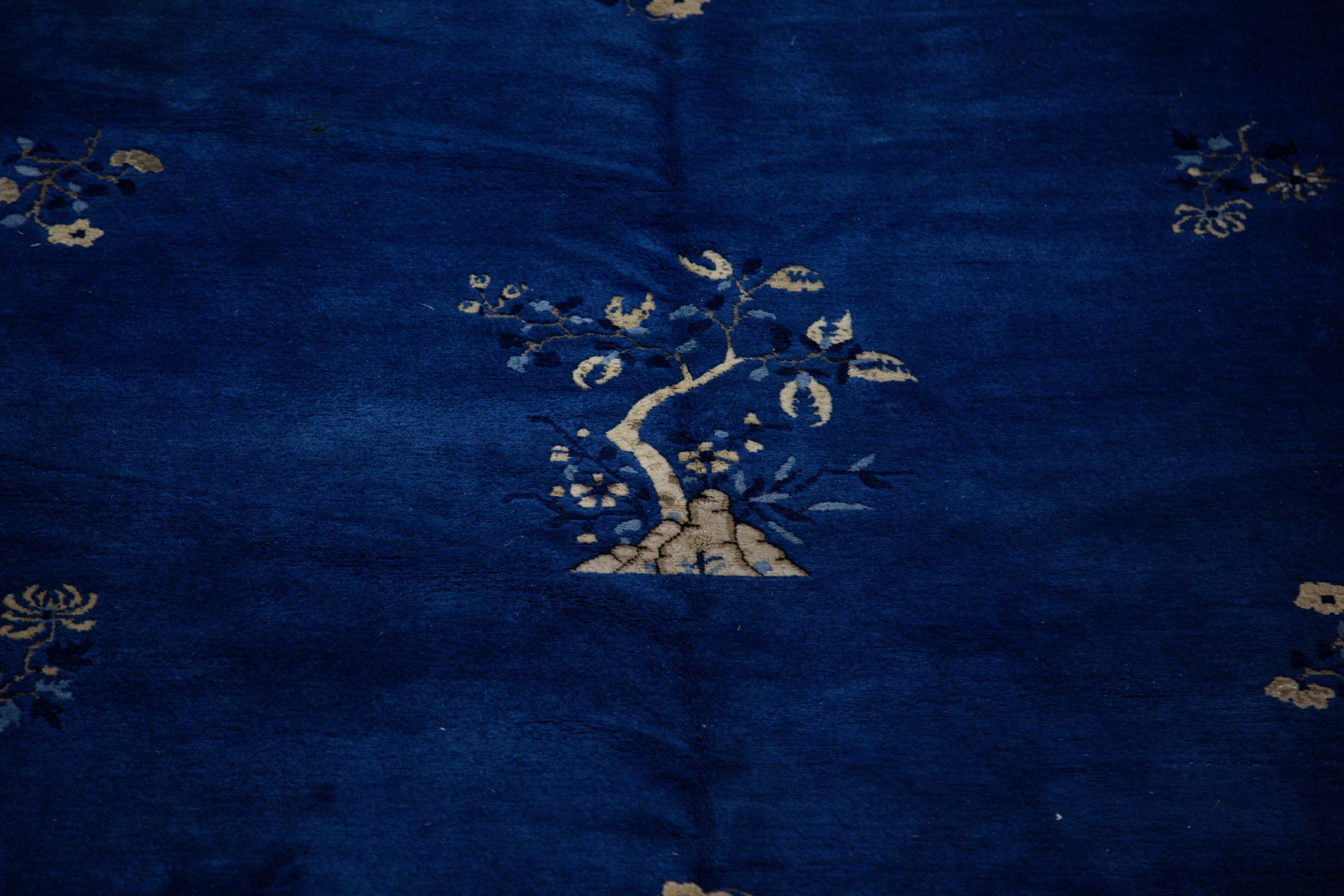 A Chinese Blue and White Wool Rug