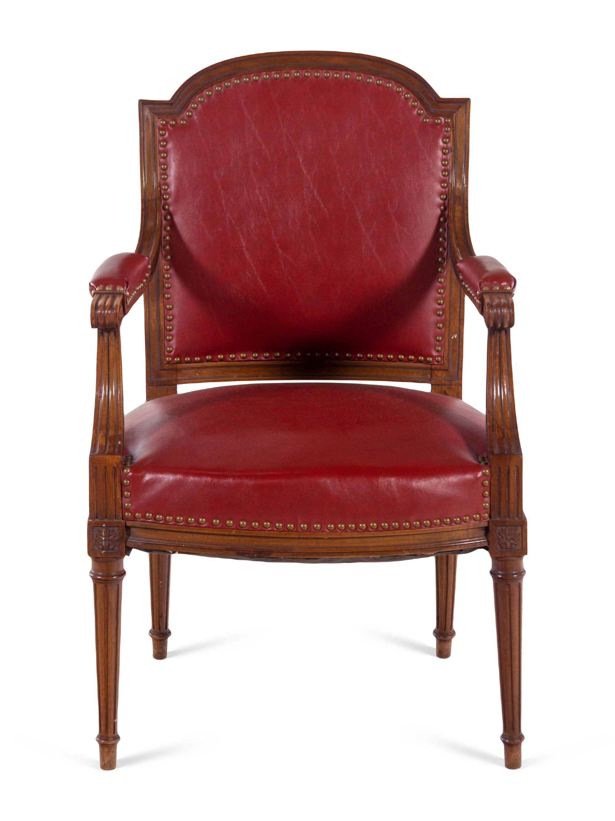 A Pair of Louis XVI Style Walnut Fauteuils